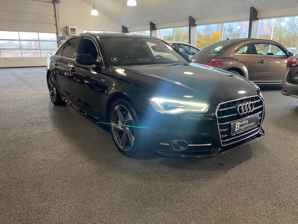 Audi A6 3,0 TDi 218 S-tr. 4d