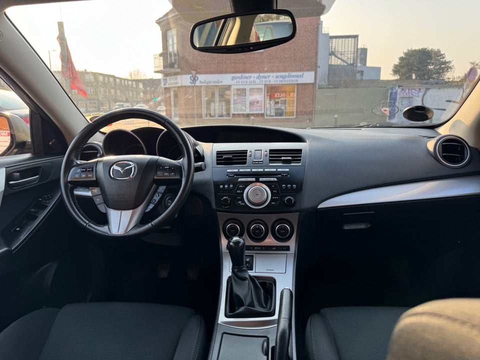 Mazda 3 1,6 DE 115 Premium 4d