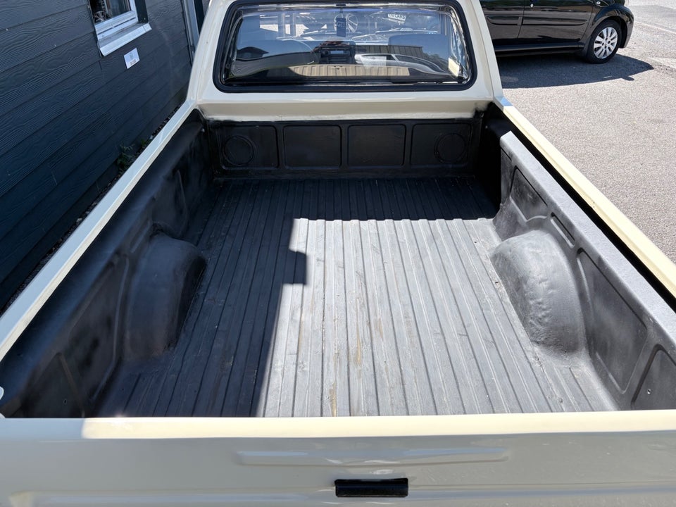 VW Caddy 1,8 Pick-up 2d
