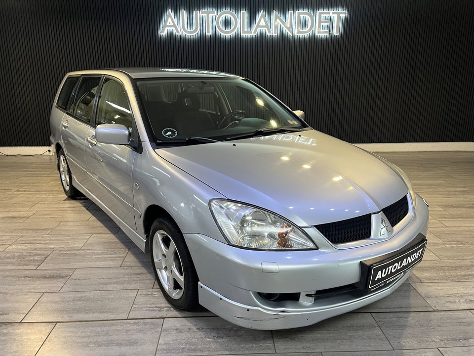 Mitsubishi Lancer 1,6 Comfort stc. 5d