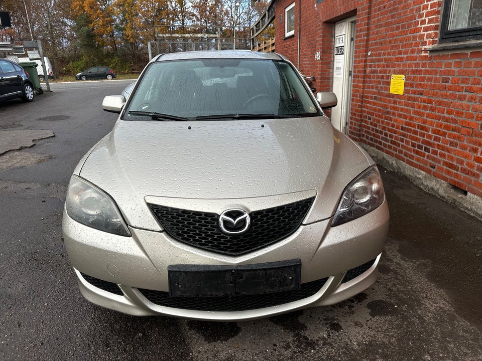 Mazda 3 1,6 Touring 4d