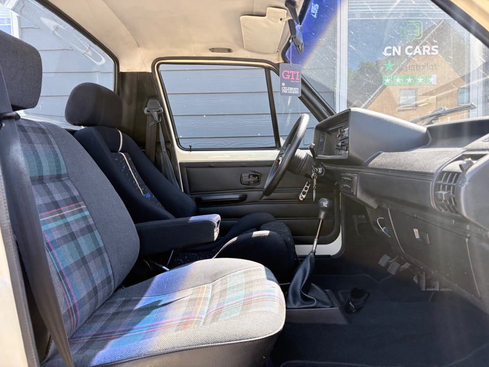 VW Caddy 1,8 Pick-up 2d