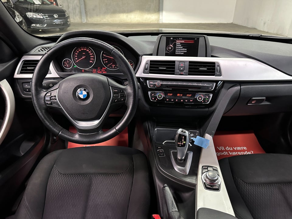 BMW 318i 1,5 Touring aut. 5d