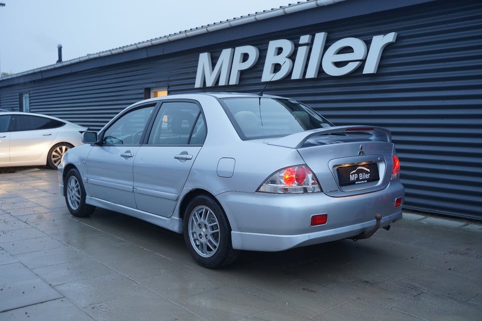 Mitsubishi Lancer 1,6 Invite 4d