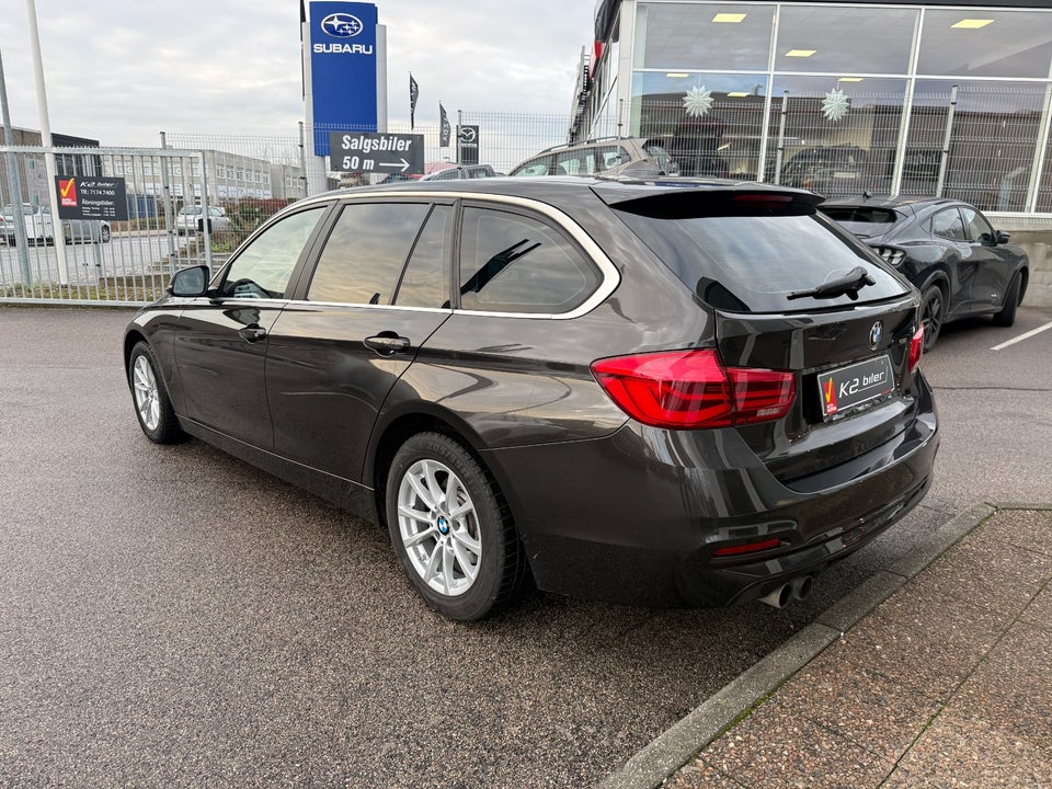 BMW 320i 2,0 Touring aut. 5d