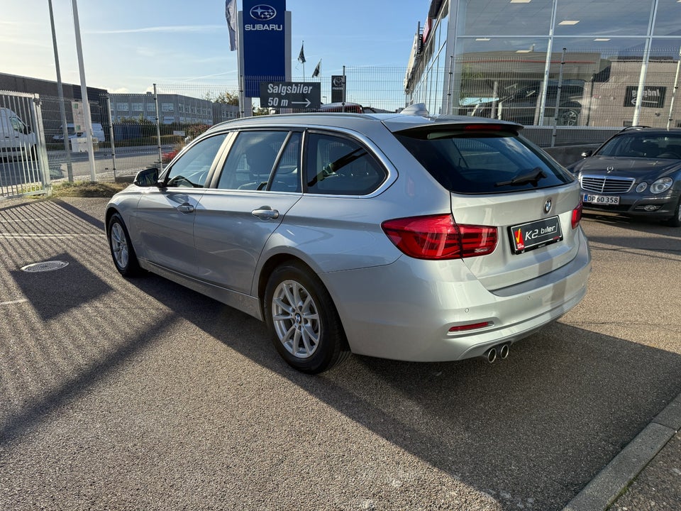 BMW 320i 2,0 Touring Advantage aut. 5d