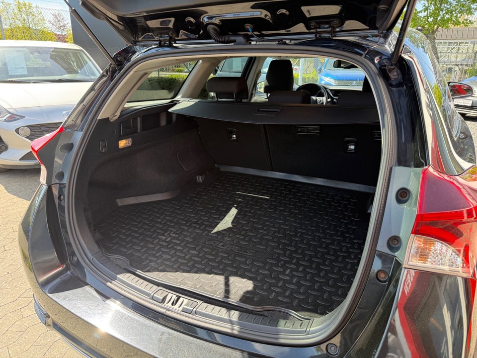 Toyota Auris 1,8 Hybrid H2 Comfort Touring Sports CVT 5d