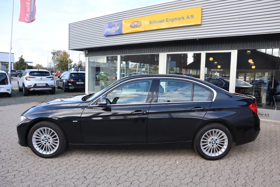 BMW 320i 2,0 aut. 4d