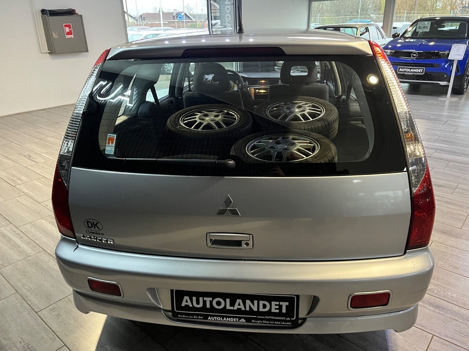 Mitsubishi Lancer 1,6 Comfort stc. 5d