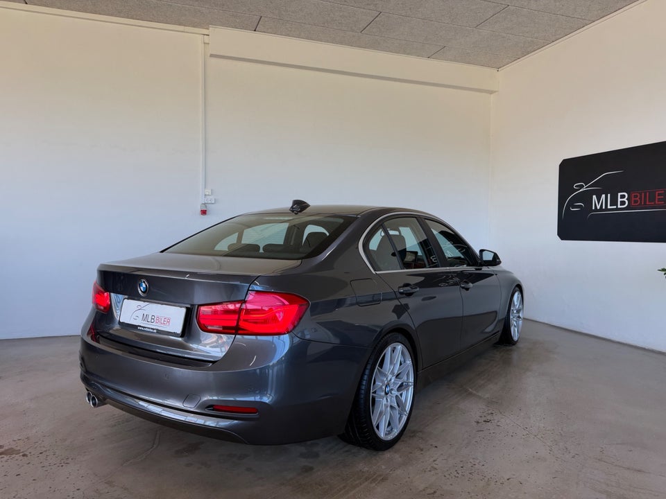 BMW 320i 2,0 Advantage aut. 4d