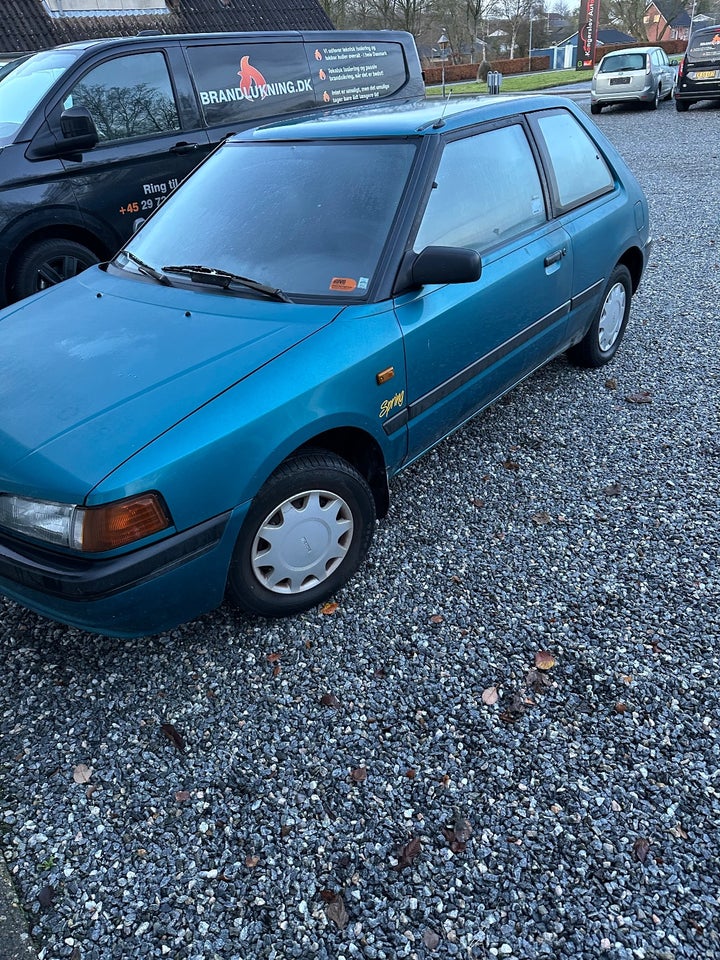 Mazda 323 1,3 Spring 4d