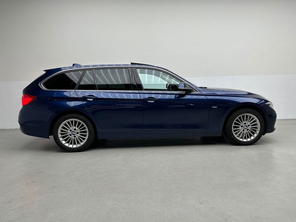 BMW 320d 2,0 Touring Executive aut. 5d