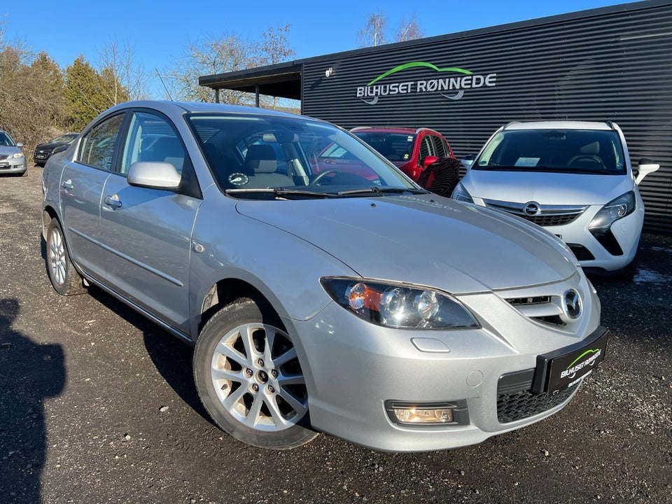Mazda 3 1,6 Touring 4d