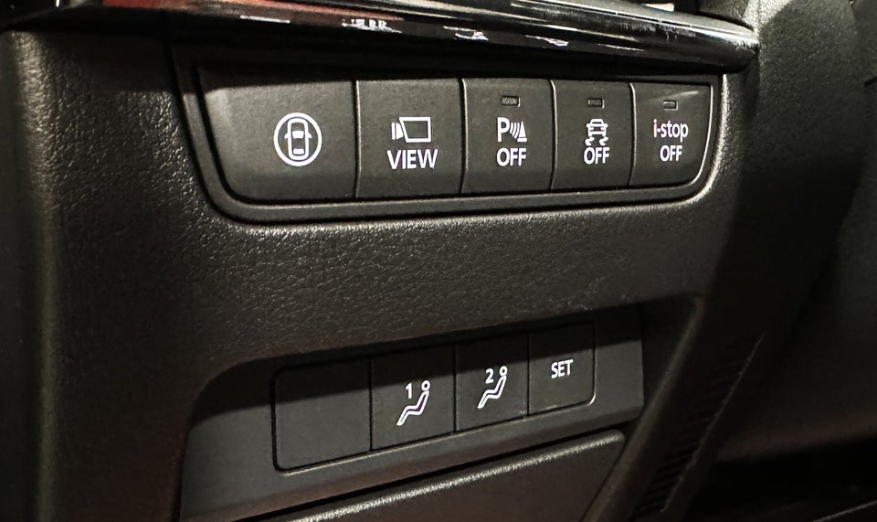 Mazda 3 2,0 SkyActiv-X 180 Cosmo Tech aut. AWD 5d