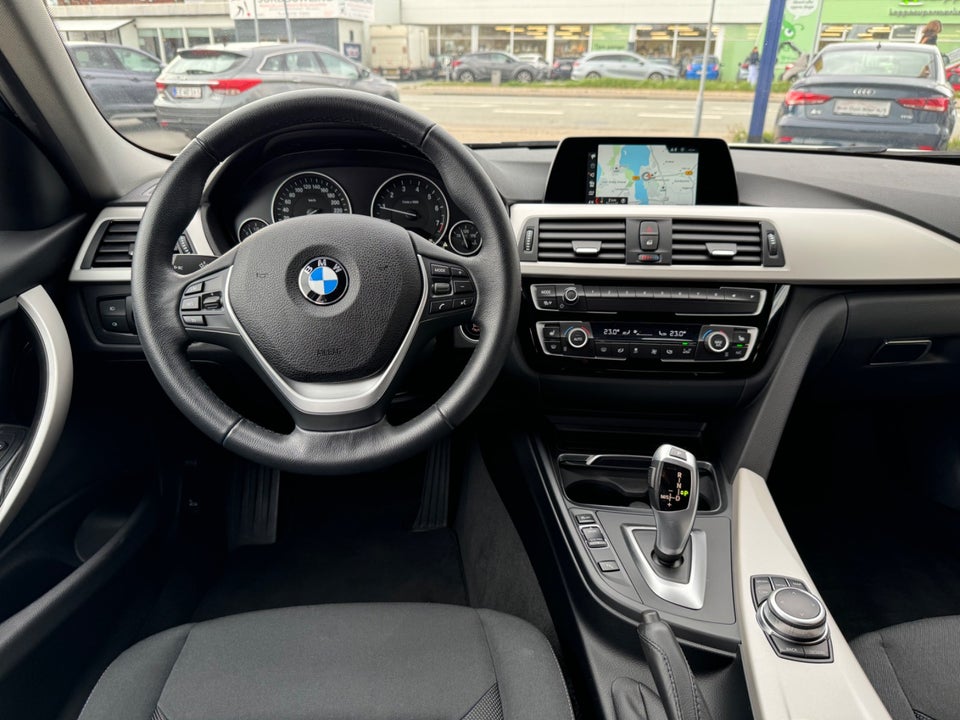 BMW 318i 2,0 Touring Advantage aut. 5d