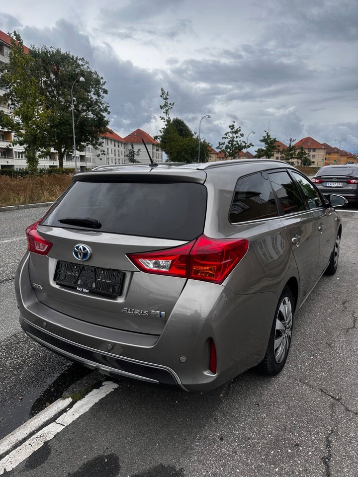 Toyota Auris 1,8 Hybrid H2+ Comfort Touring Sports CVT 5d
