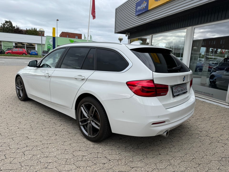 BMW 318i 2,0 Touring Advantage aut. 5d