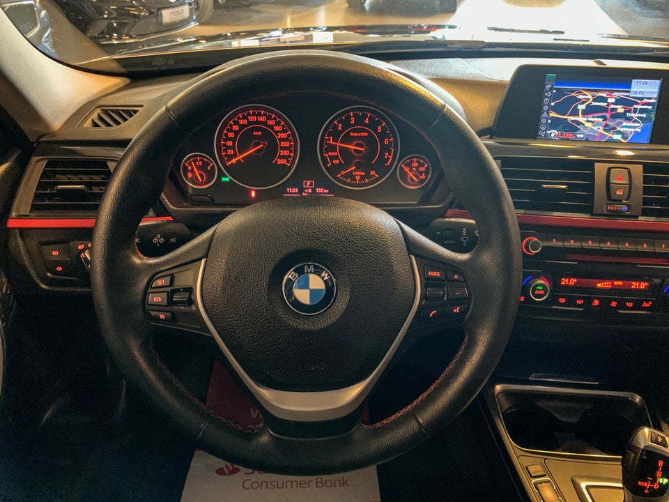 BMW 320i 2,0 Touring aut. 5d