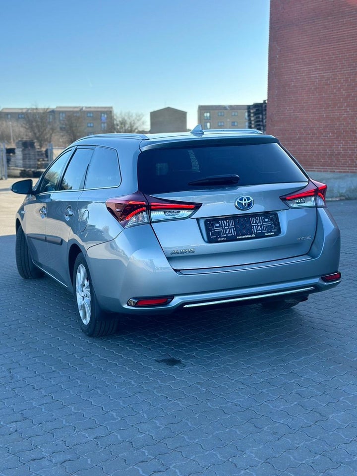 Toyota Auris 1,8 Hybrid H2 Comfort Touring Sports CVT 5d