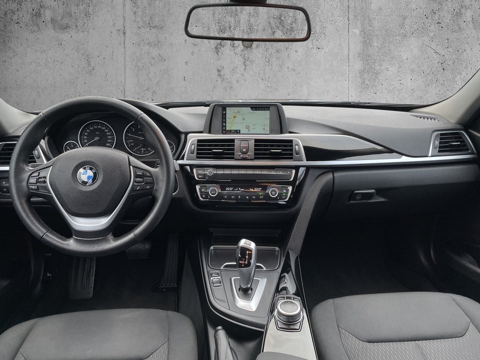 BMW 320i 2,0 Advantage aut. 4d