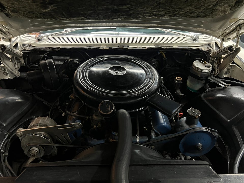 Cadillac Coupé DeVille 6,4 aut. 2d