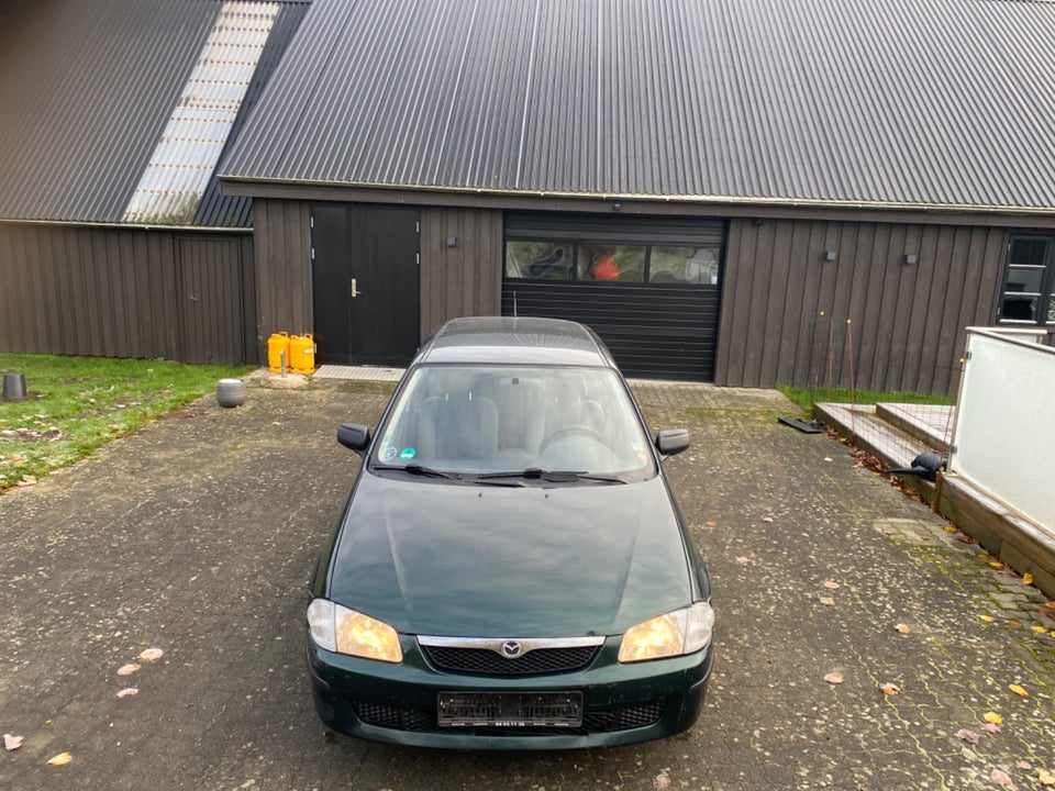 Mazda 323 1,3 LX 4d