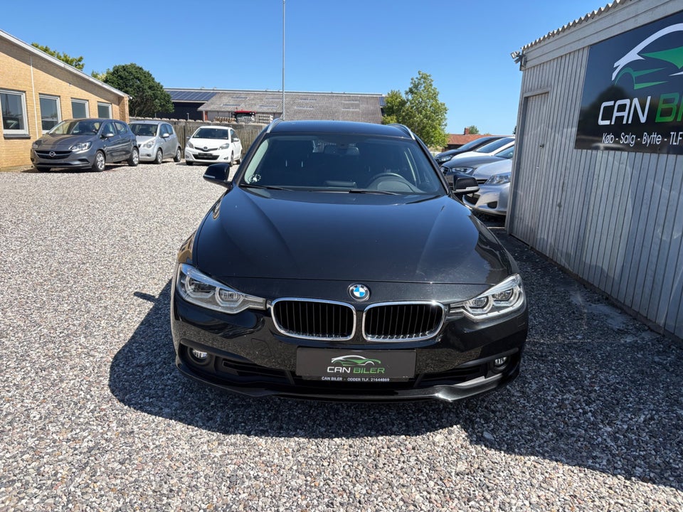 BMW 320i 2,0 Touring aut. 5d
