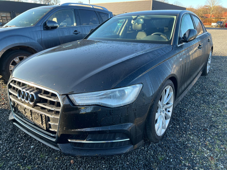 Audi A6 3,0 TDi 218 S-line S-tr. 4d