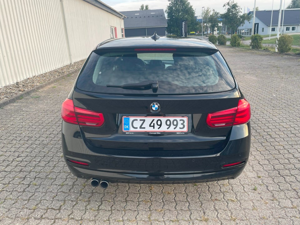 BMW 320i 2,0 Touring aut. 5d