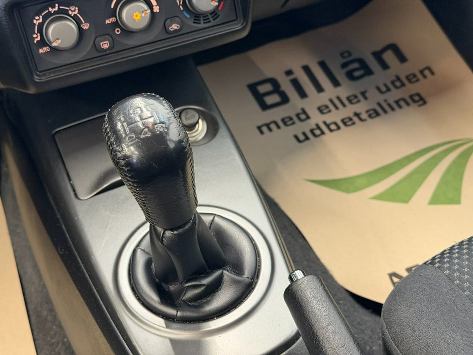 Mitsubishi Lancer 1,6 Comfort stc. 5d