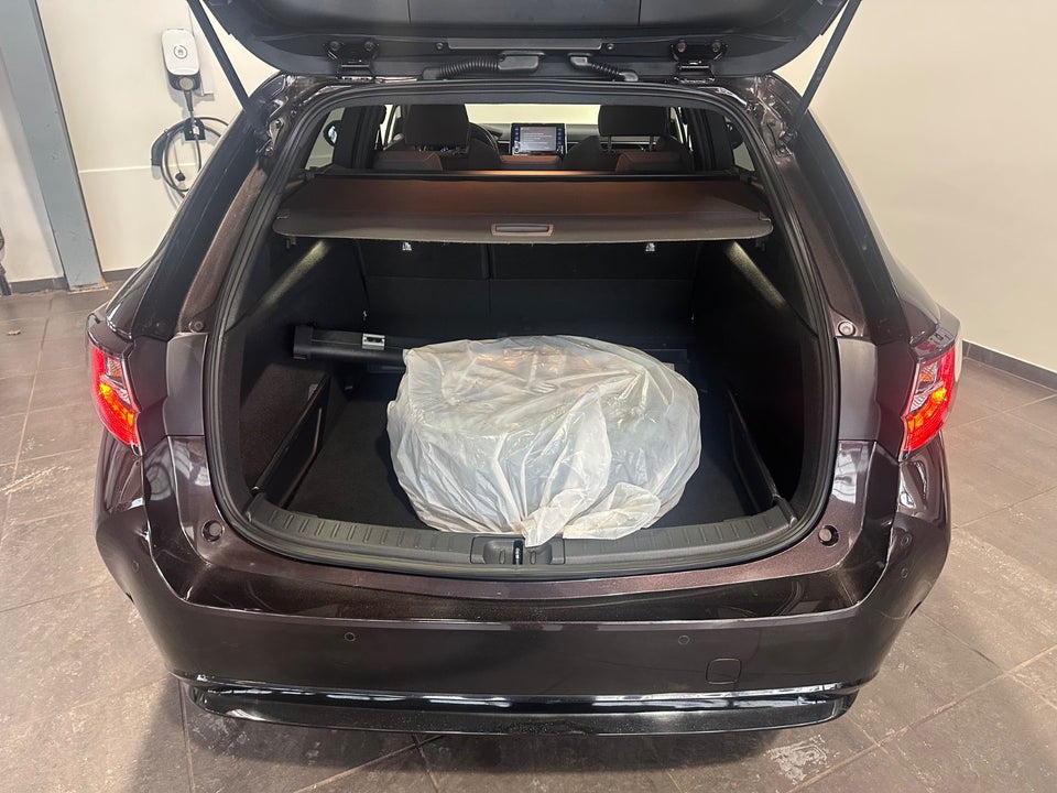 Suzuki Swace 1,8 HEV Exclusive stc. e-CVT 5d