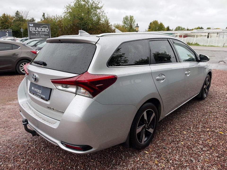 Toyota Auris 1,8 Hybrid H2 Comfort Touring Sports CVT 5d