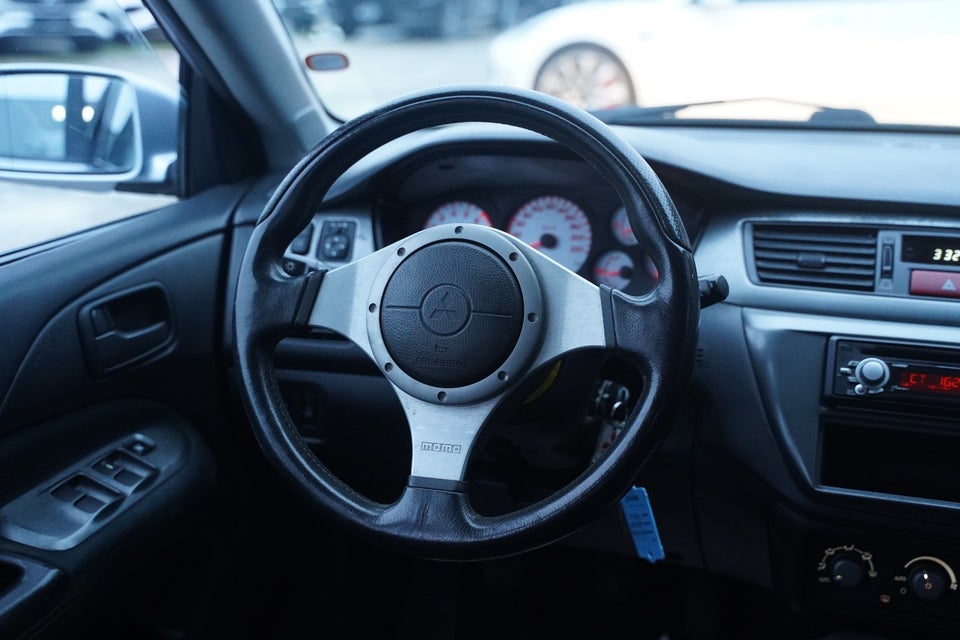 Mitsubishi Lancer 1,6 Invite 4d