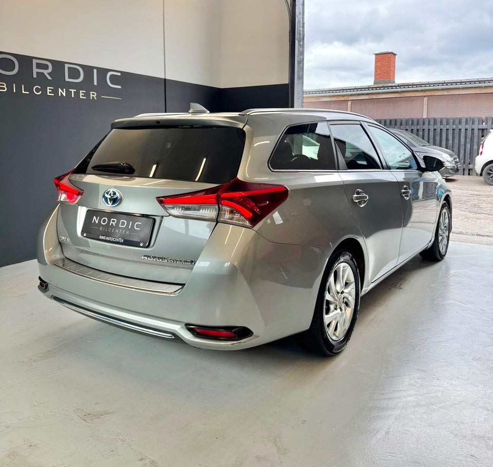 Toyota Auris 1,8 Hybrid H2 Comfort Touring Sports CVT 5d