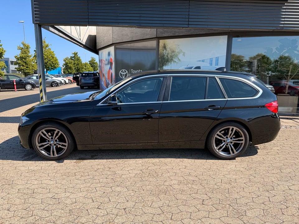 BMW 320i 2,0 Touring aut. 5d