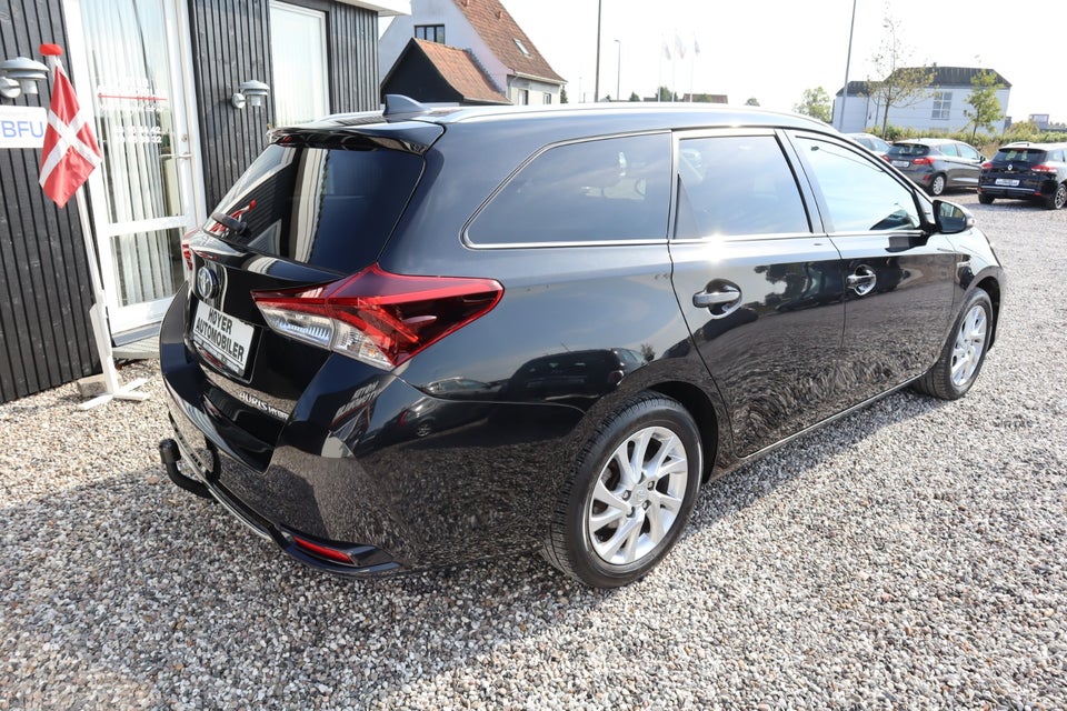 Toyota Auris 1,8 Hybrid H2 Comfort Touring Sports CVT 5d