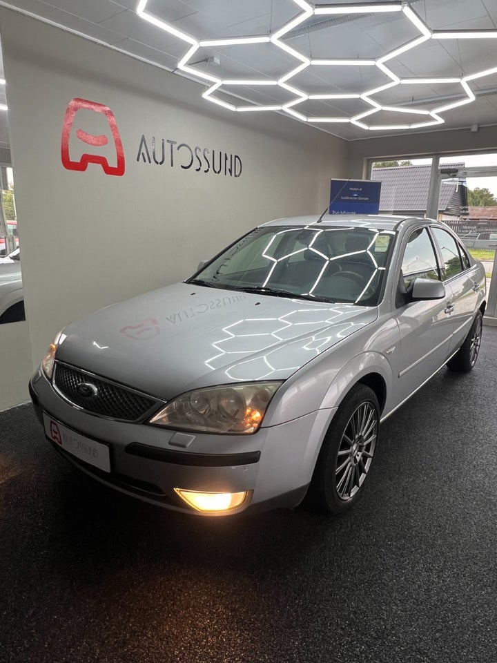 Ford Mondeo 1,8 SCi 130 Ghia X 4d