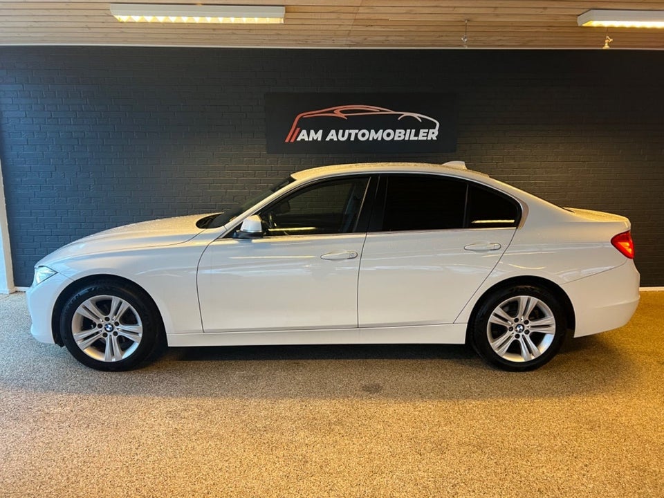 BMW 320i 2,0 aut. 4d