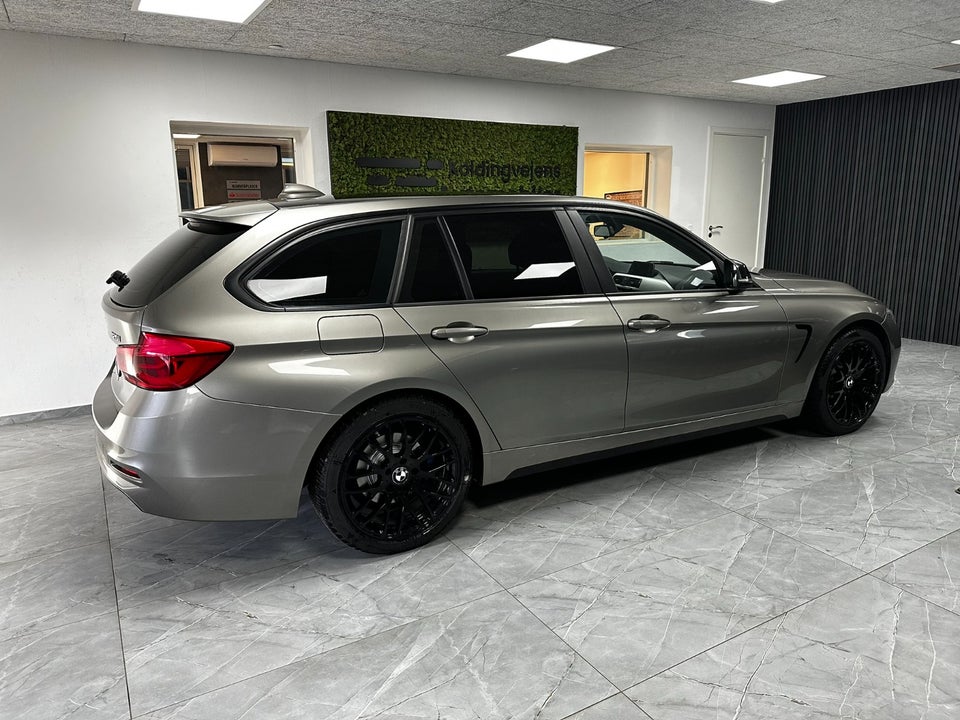 BMW 320i 2,0 Touring aut. 5d