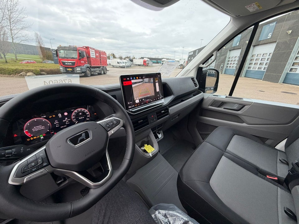 MAN TGE 2,0 3.180 Kassevogn L3H3 aut. FWD