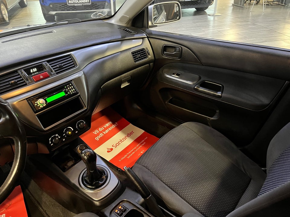 Mitsubishi Lancer 1,6 Comfort stc. 5d