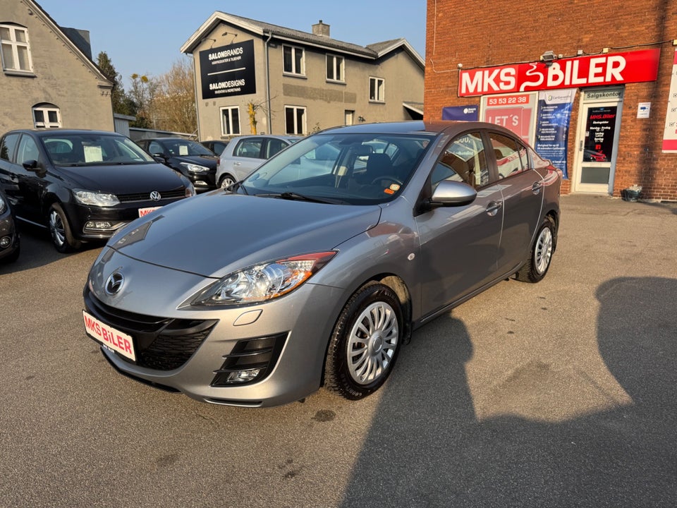 Mazda 3 1,6 DE 115 Premium 4d