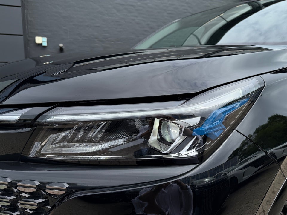 Navor E5 1,5 PHEV Rock 5d