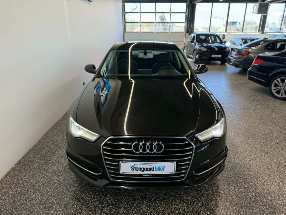 Audi A6 3,0 TDi 218 S-line S-tr. 4d