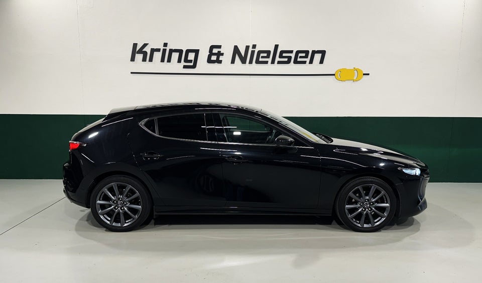 Mazda 3 2,0 SkyActiv-X 180 Cosmo Tech aut. AWD 5d