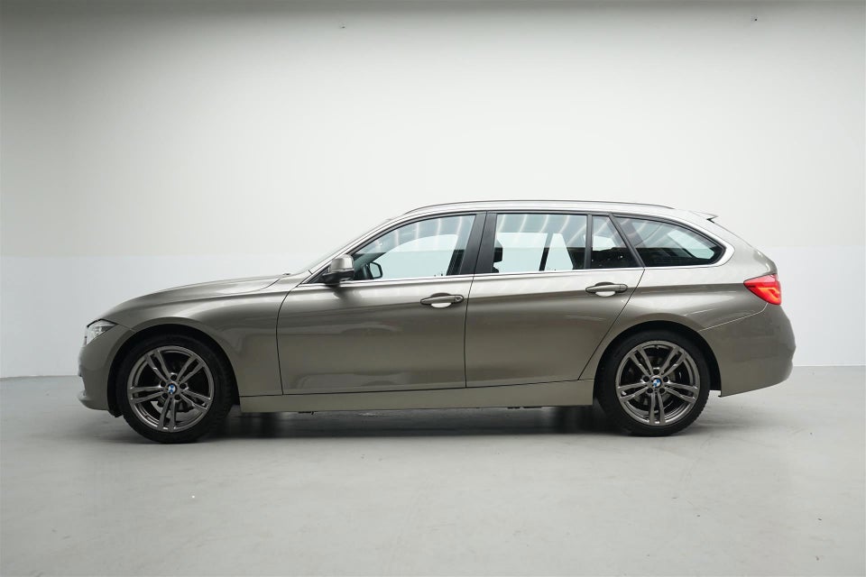 BMW 320i 2,0 Touring Executive aut. 5d