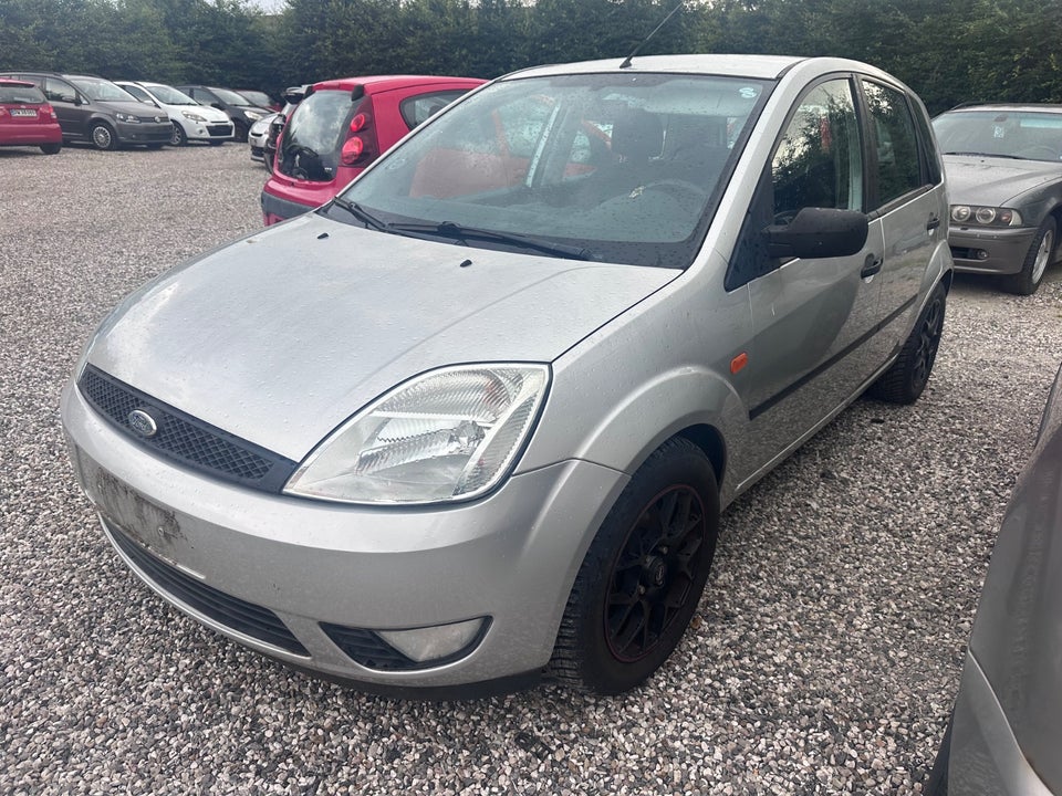 Ford Fiesta 1,4 Ghia aut. 5d